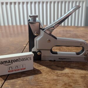 Amazon Basics Heavy Duty Staple Gun, 3 in 1 Stapler with 600 Piece Staples, for Upholstery, Home Repair, Carpentry, Decoration and Furniture, Black/Silver