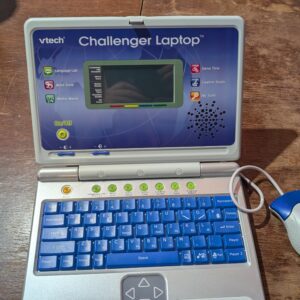 VTech Challenger Laptop, Blue, Kids Laptop with Vocabulary, Maths and French Learning Games, 2 Player Kids Computer, Educational Toy Computer for Kids, Fun Laptop, Boys and Girls Ages 4 Years +